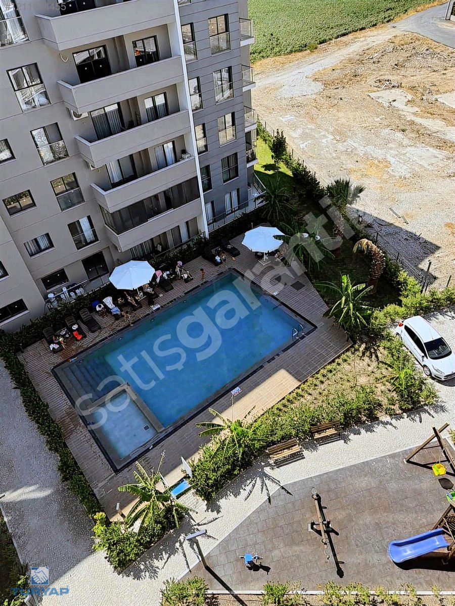 HAVUZLU GÜVENLİKLİ SİTEDE FULL KREDİ İMKANI 2+1 SATILIK DAİRE