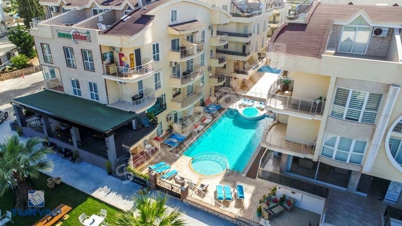 DİDİM SATILIK DENİZE YAKIN HAVUZLU SİTEDE FULL EŞYALI 2+1 DAİRE