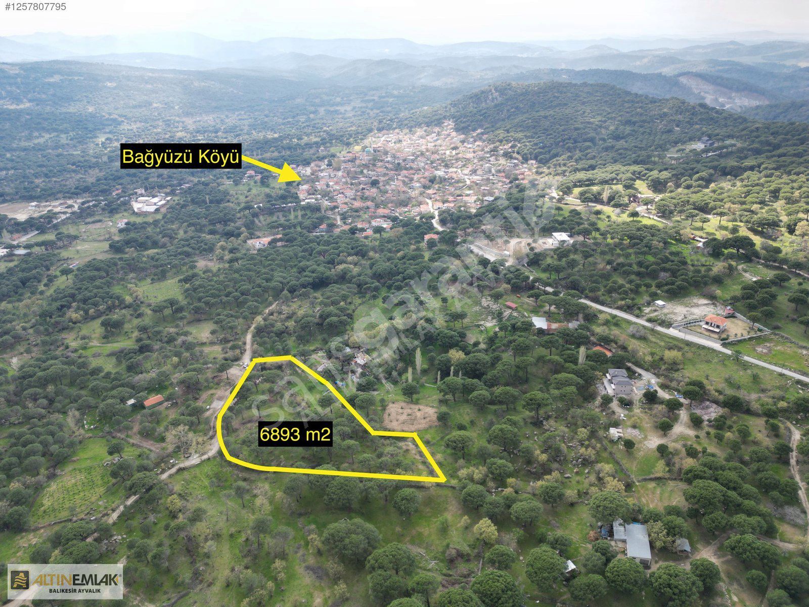 ALTIN EMLAKTAN AYVALIK BAĞYÜZÜNDE SATILIK 6893M2 TARLA