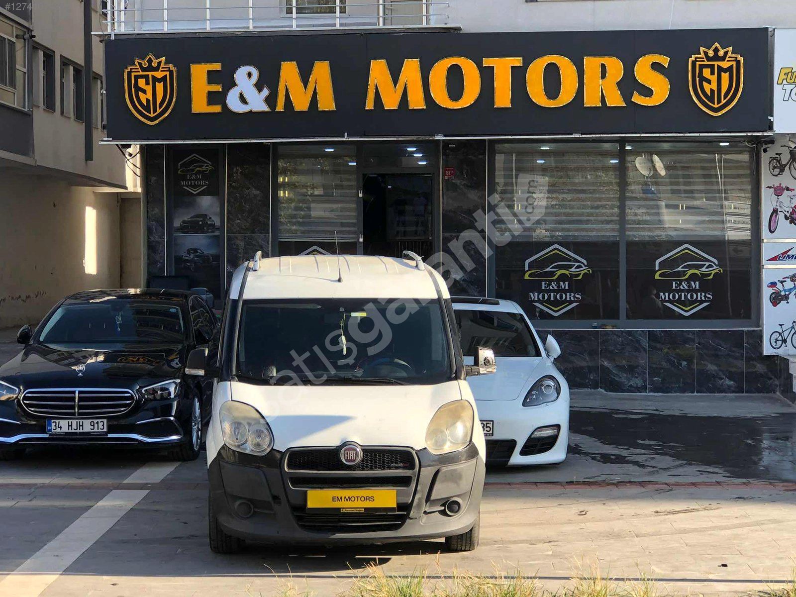 E&M MOTORS'TAN