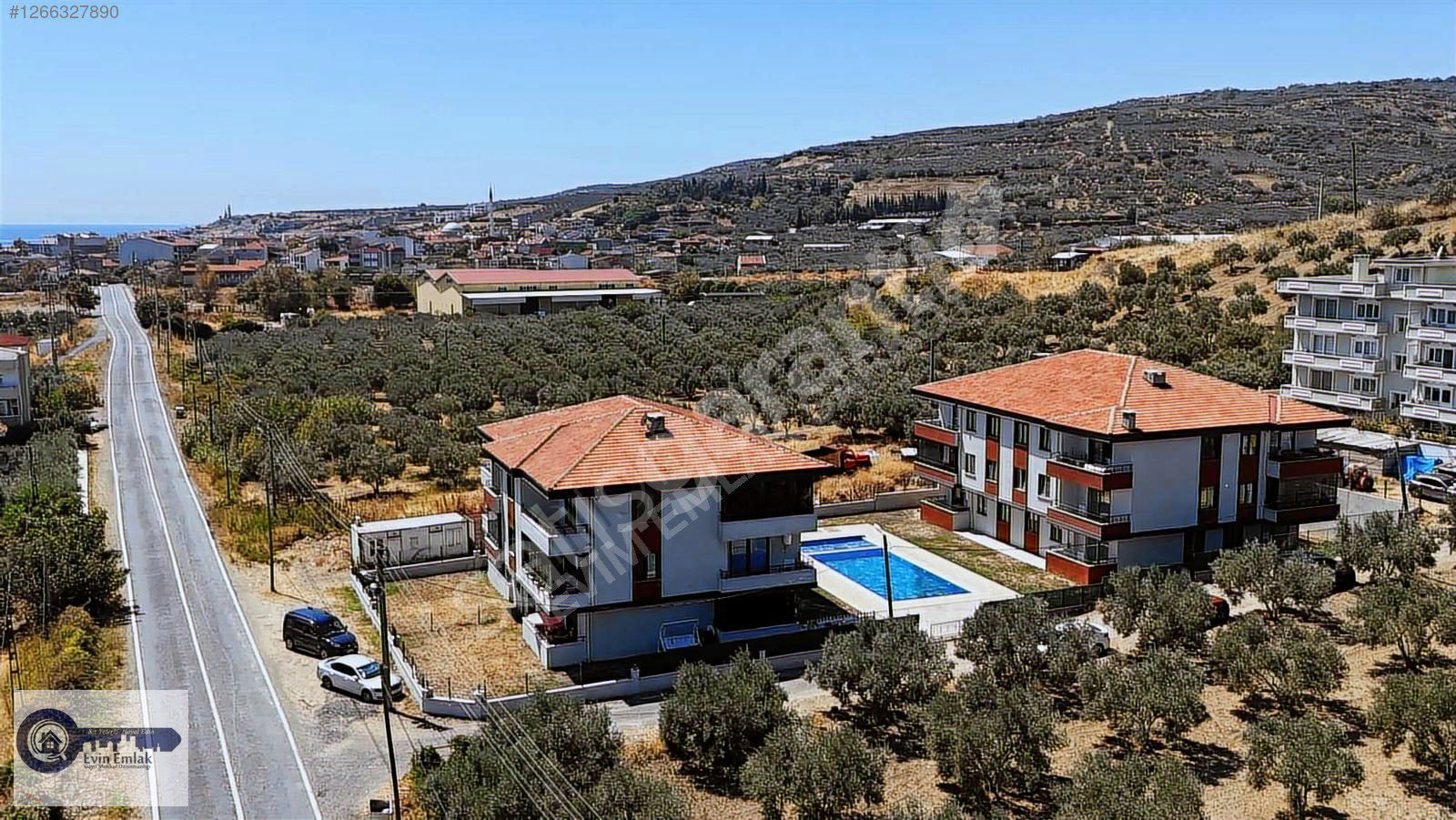 Site içinde yeni bina deniz ve havuz manzaralı daire