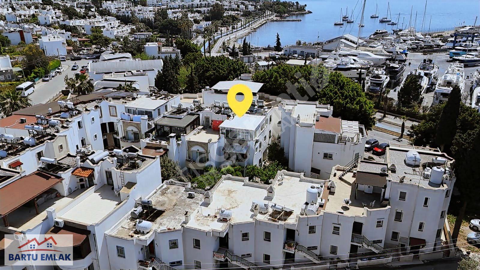 Bodrum turgutreis merkezde sahile yakın bahçe katı satılk daire