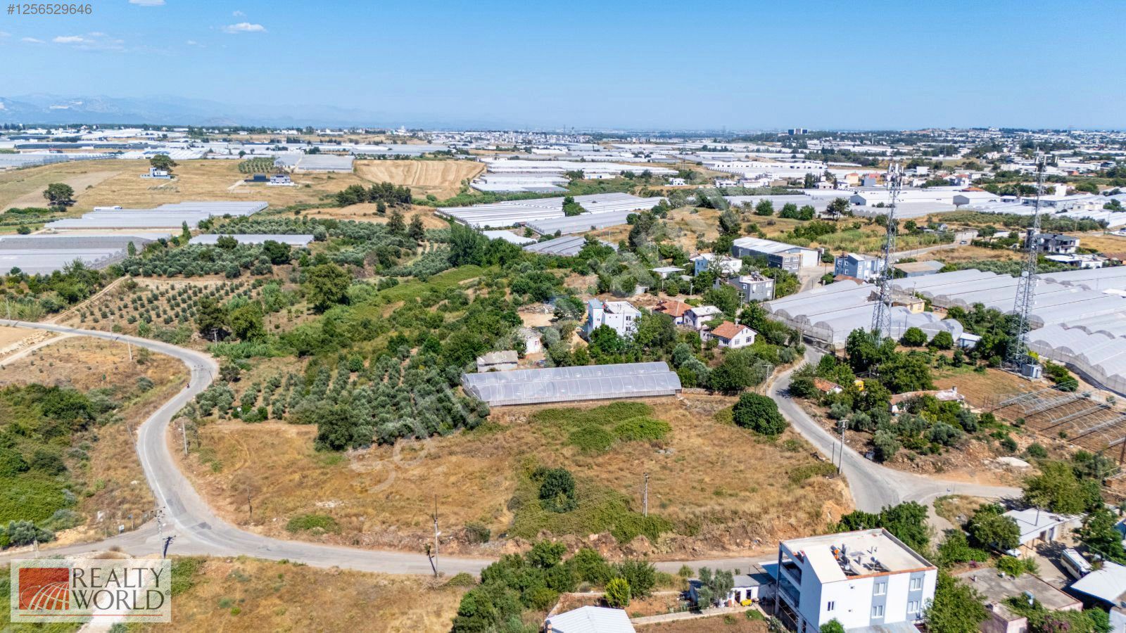 ANTALYA AKSU ÇAMKÖY DE 7407 m² SATILIK TEK TAPU TARLA