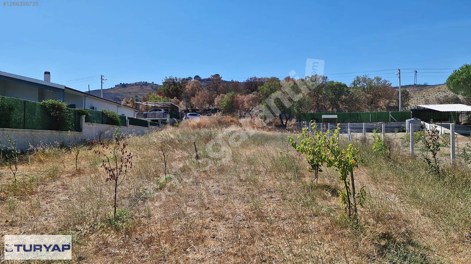 SEFERİHİSAR KAVAKDERE KÖYÜNDE İMARLI SATILIK 1000 M2 ARSA