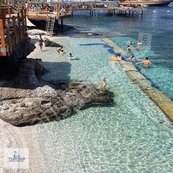 AURA'DA,BODRUM MERKEZDE,GÜVENLİKLİ,HAVUZLU,DENİZE"0"SİTE