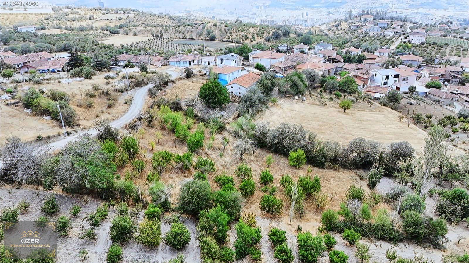 MERKEZ KOCACIK KÖYÜNDE KÖY İÇİNDE TEK TAPU 1.069 m² TARLA